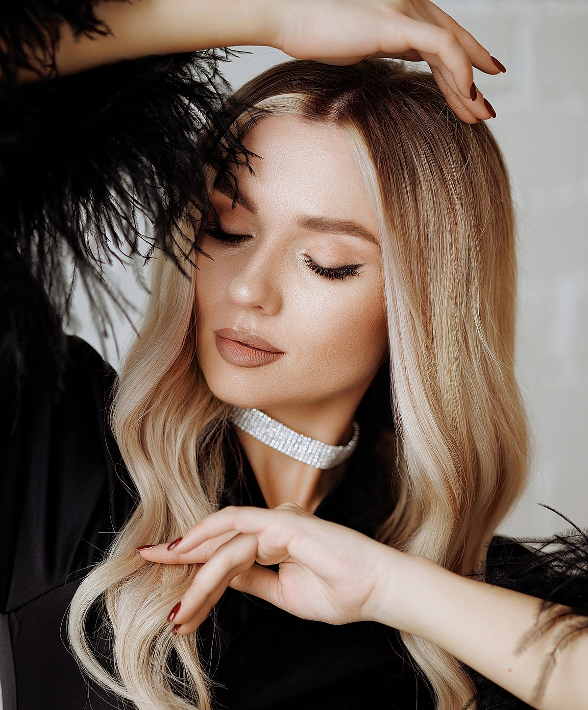 Woman with stylish hair and elegant accessories.