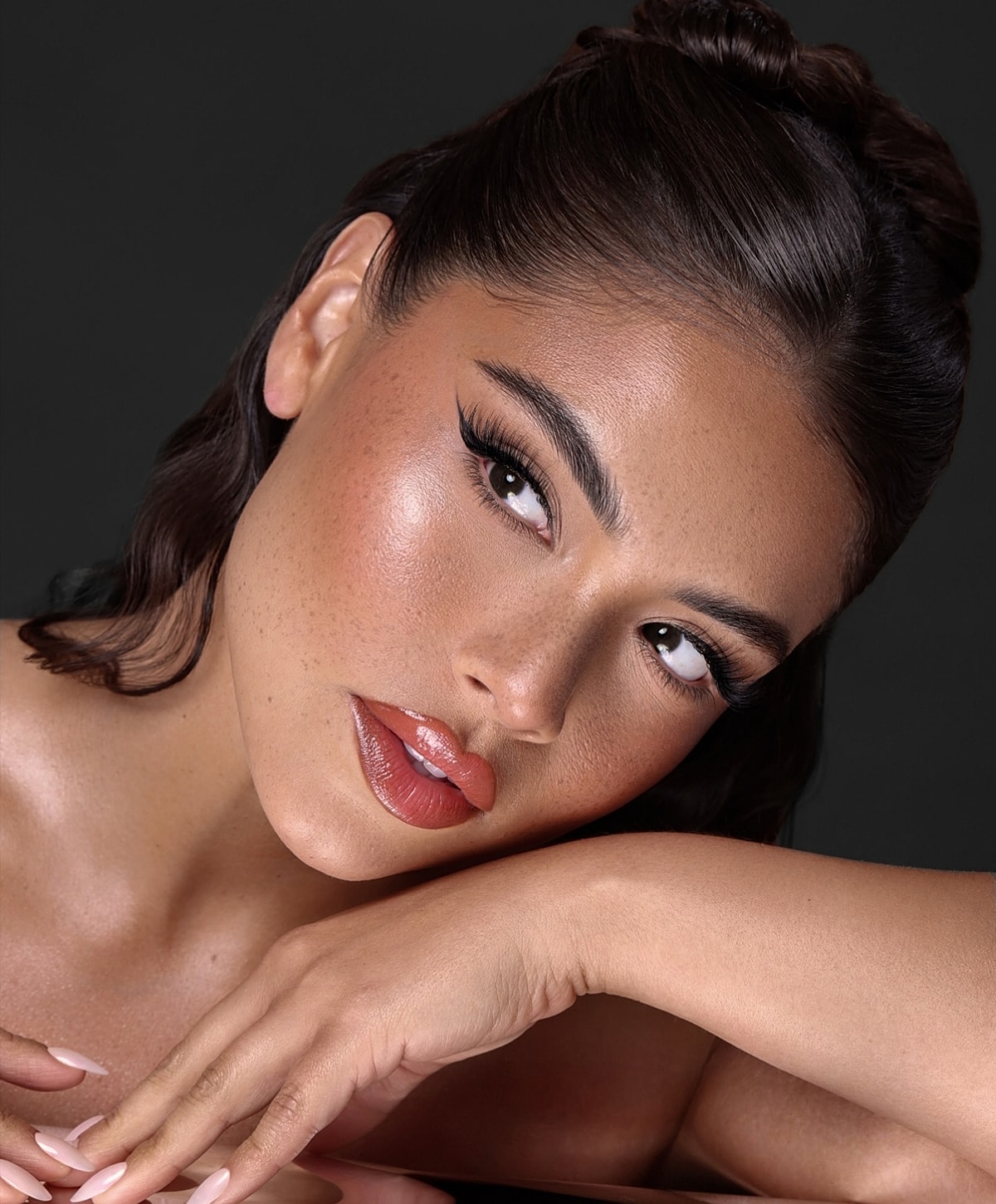 Woman with beauty makeup and glossy lips.