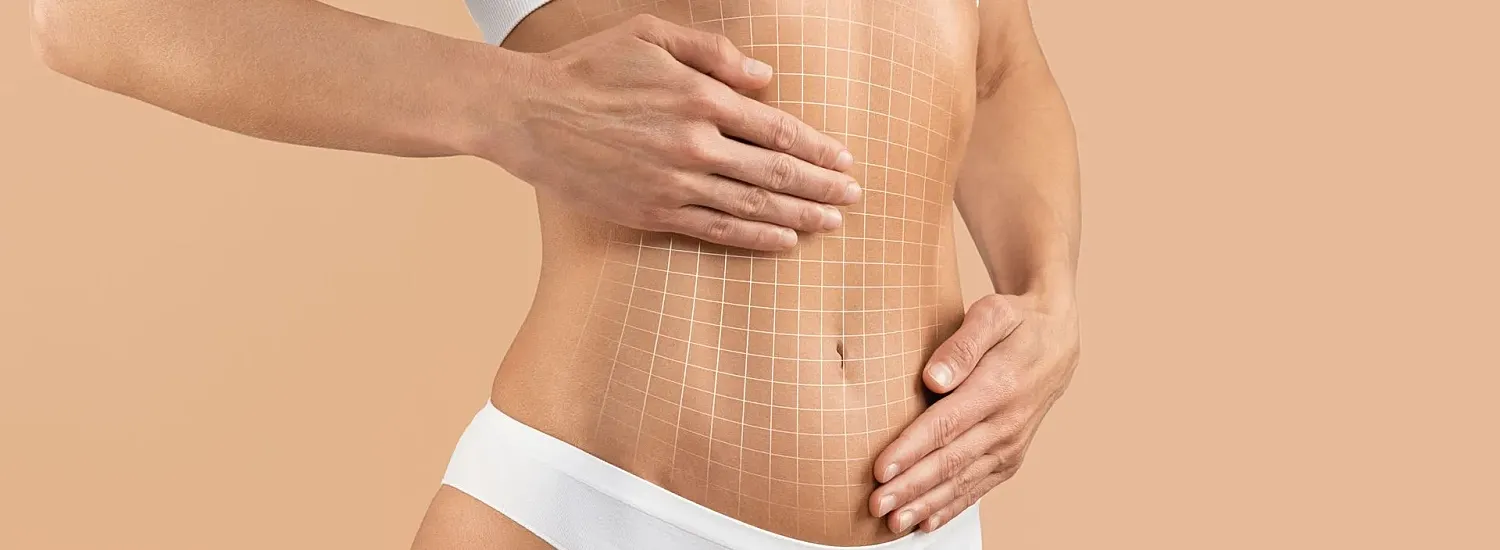 Woman's abdomen with grid pattern overlay.